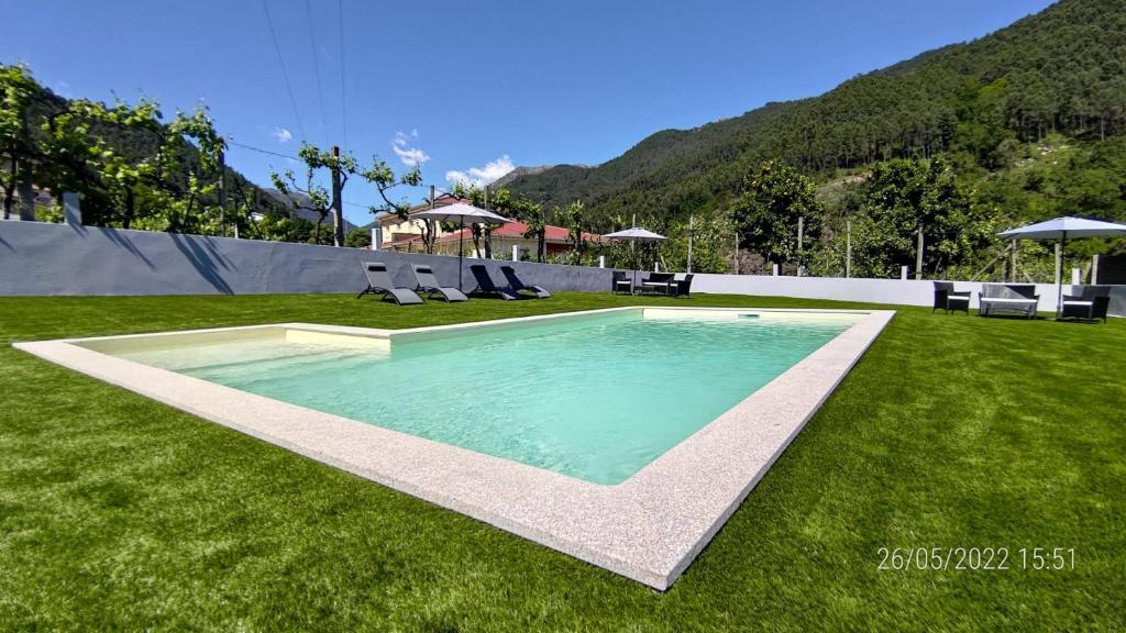CASA MANOS NÉVOA