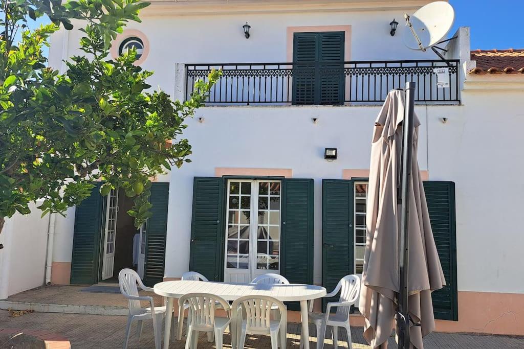 CASA DAS JANELAS VERDES
